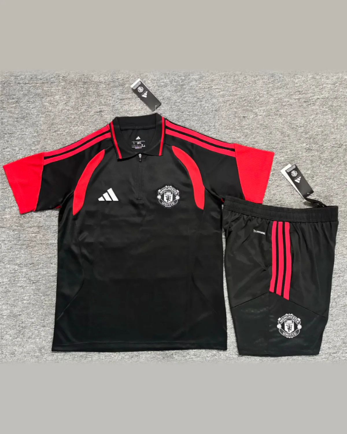 Manchester United 2026/27 Manchester United Black Polo Shirt Set With Black Trousers football jersey